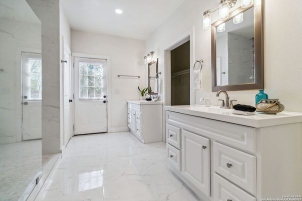 Bathroom, Dual Sink Vanities, Glass Shower, Interior, Marble, Marble Walls, Recessed Lighting