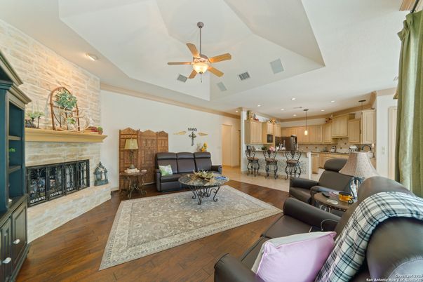 Fireplace, Interior, Kitchen, Living room, Pendant Lights, Recessed Lighting, Stone Walls, Wood Texture Flooring