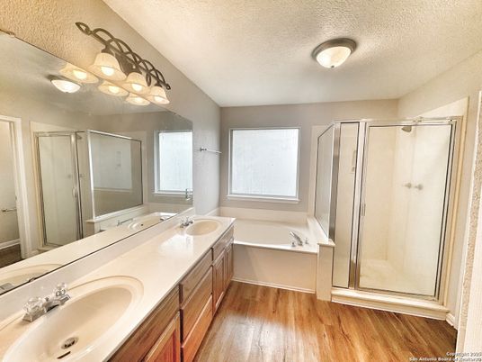 Bathroom, Dual Sink Vanities, Glass Shower, Interior, Wood Texture Flooring
