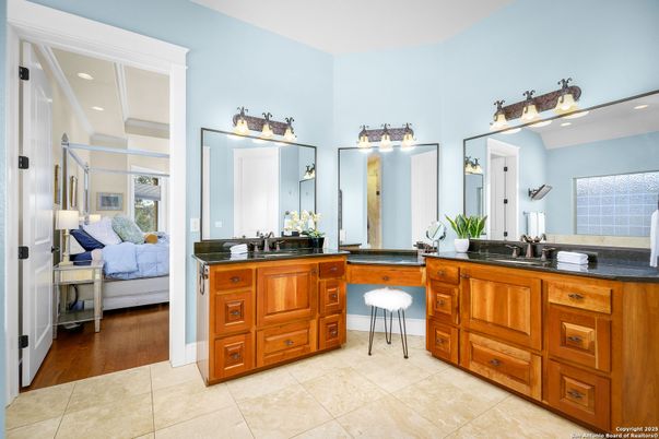 Bathroom, Dual Sink Vanities, Interior, Recessed Lighting, Wood Texture Flooring