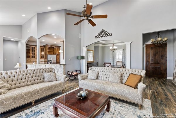 Chandelier, Dining room, Interior, Kitchen, Living room, Recessed Lighting, Stainless Steel Appliances, Wood Texture Flooring