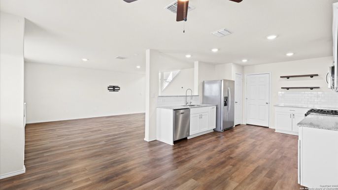Interior, Kitchen, Recessed Lighting, Stainless Steel Appliances, Wood Texture Flooring