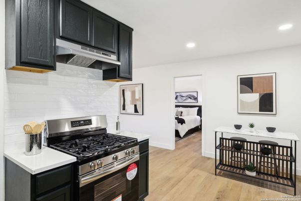 Bedroom, Interior, Kitchen, Living room, Recessed Lighting, Stainless Steel Appliances, Wood Texture Flooring