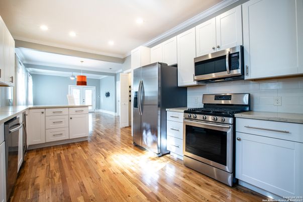 Interior, Kitchen, Pendant Lights, Recessed Lighting, Stainless Steel Appliances, Wood Texture Flooring