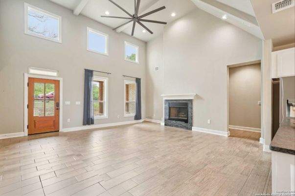Fireplace, Interior, Pendant Lights, Recessed Lighting, Wood Texture Flooring