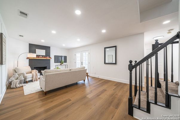 Fireplace, Interior, Living room, Recessed Lighting, Wood Texture Flooring