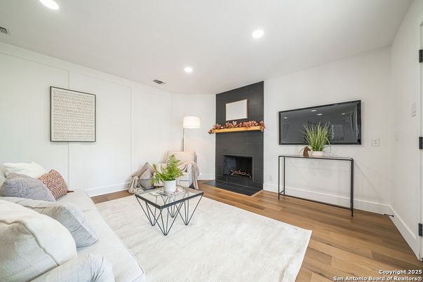 Fireplace, Interior, Living room, Recessed Lighting, Wood Texture Flooring