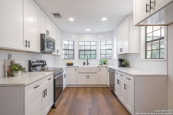 Interior, Kitchen, Recessed Lighting, Stainless Steel Appliances, Wood Texture Flooring