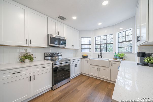 Interior, Kitchen, Recessed Lighting, Stainless Steel Appliances, Wood Texture Flooring