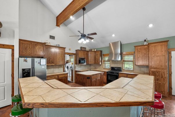 Interior, Kitchen, Recessed Lighting, Tile Countertops, Wooden Beams