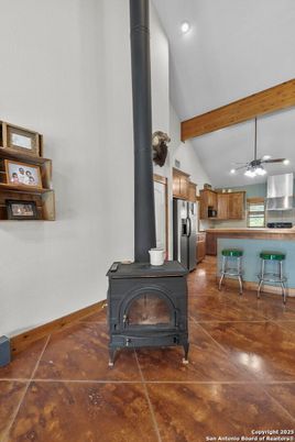 Fireplace, Interior, Kitchen, Recessed Lighting, Stainless Steel Appliances, Wooden Beams