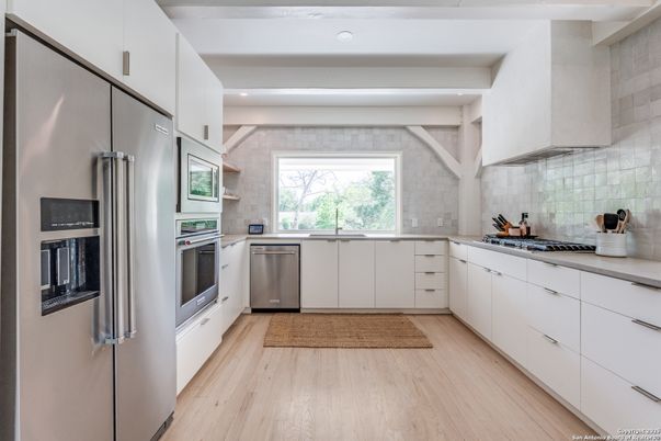Interior, Kitchen, Recessed Lighting, Stainless Steel Appliances, Wood Texture Flooring