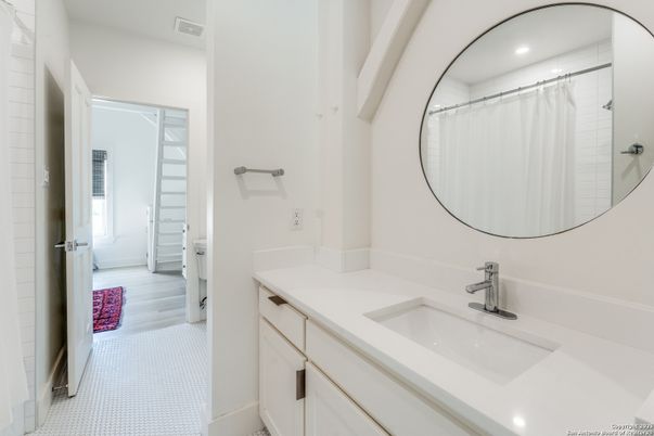 Bathroom, Dual Sink Vanities, Interior, Recessed Lighting, Wood Texture Flooring