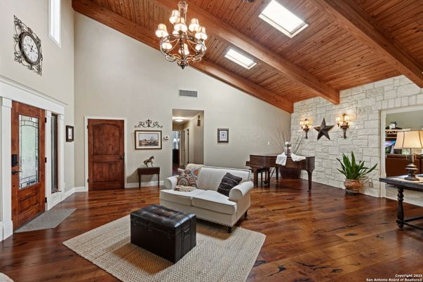Chandelier, Interior, Living room, Piano, Stone Walls, Wooden Beams, Wooden Ceilings, Wood Texture Flooring