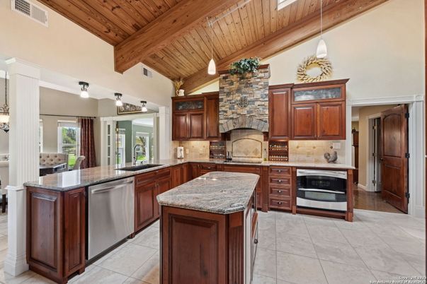 Fireplace, Interior, Kitchen, Pendant Lights, Stainless Steel Appliances, Stone Walls, Wooden Beams, Wooden Ceilings