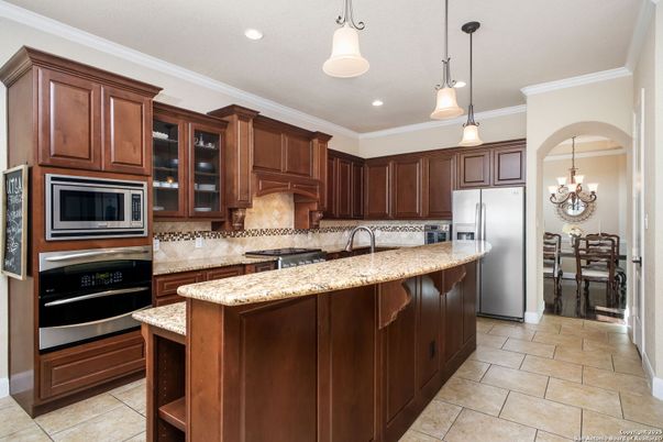 Chandelier, Dining room, Interior, Kitchen, Pendant Lights, Recessed Lighting, Stainless Steel Appliances