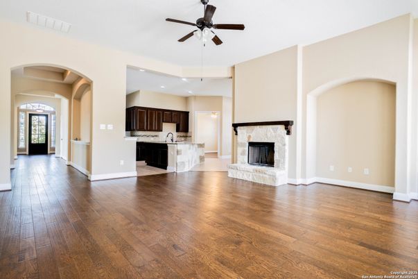 Empty room, Fireplace, Interior, Kitchen, Recessed Lighting, Wood Texture Flooring
