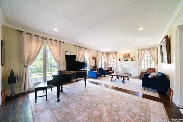 Fireplace, Interior, Living room, Piano, Recessed Lighting, Wood Texture Flooring