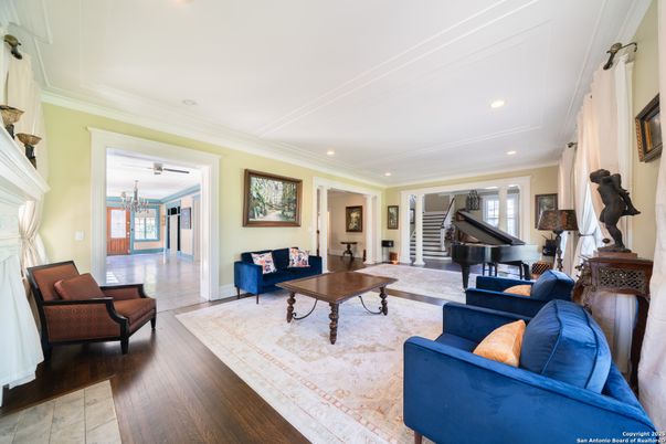 Fireplace, Interior, Living room, Piano, Recessed Lighting, Wood Texture Flooring