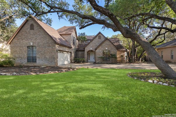 Attached, Backyard, Exterior, Facade, Brick Facade, Tudor Revival