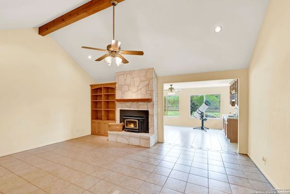 Empty room, Fireplace, Interior, Recessed Lighting, Wooden Beams