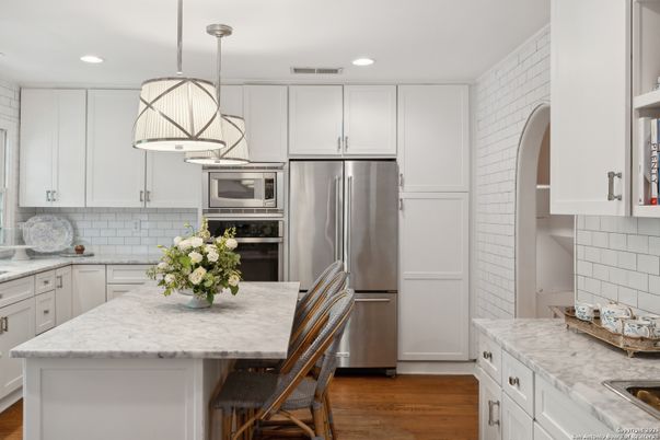Interior, Kitchen, Pendant Lights, Recessed Lighting, Stainless Steel Appliances, Wood Texture Flooring
