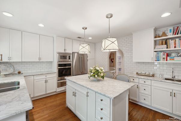 Interior, Kitchen, Pendant Lights, Recessed Lighting, Stainless Steel Appliances, Wood Texture Flooring