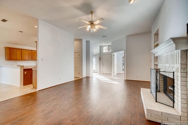 Empty room, Fireplace, Interior, Kitchen, Recessed Lighting, Wood Texture Flooring