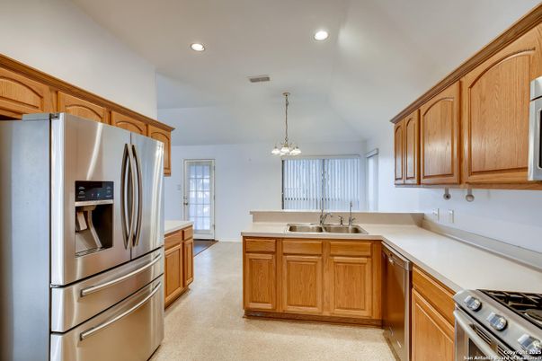 Chandelier, Interior, Kitchen, Pendant Lights, Recessed Lighting, Stainless Steel Appliances