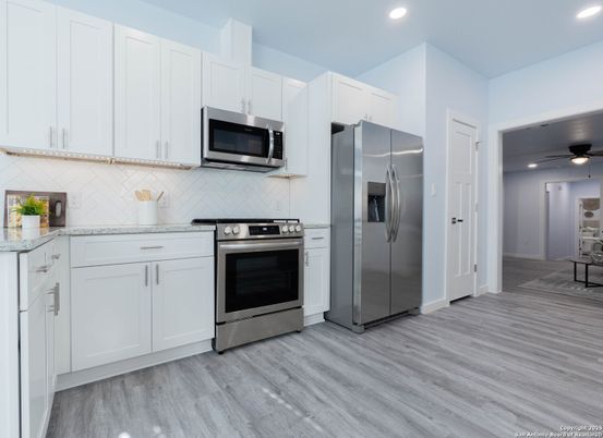 Interior, Kitchen, Recessed Lighting, Stainless Steel Appliances, Wood Texture Flooring