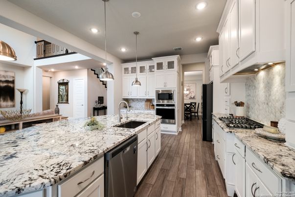 Dining room, Interior, Kitchen, Pendant Lights, Recessed Lighting, Stainless Steel Appliances, Wood Texture Flooring