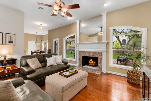 Dining room, Fireplace, Interior, Living room, Pendant Lights, Recessed Lighting, Wood Texture Flooring