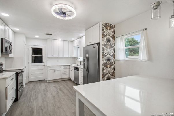 Interior, Kitchen, Recessed Lighting, Stainless Steel Appliances, Wood Texture Flooring