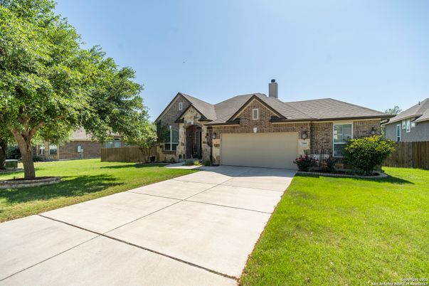 Attached, Backyard, Exterior, Facade, Brick Facade, Brick Traditional