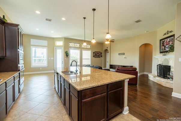 Fireplace, Interior, Kitchen, Pendant Lights, Recessed Lighting, Wood Texture Flooring