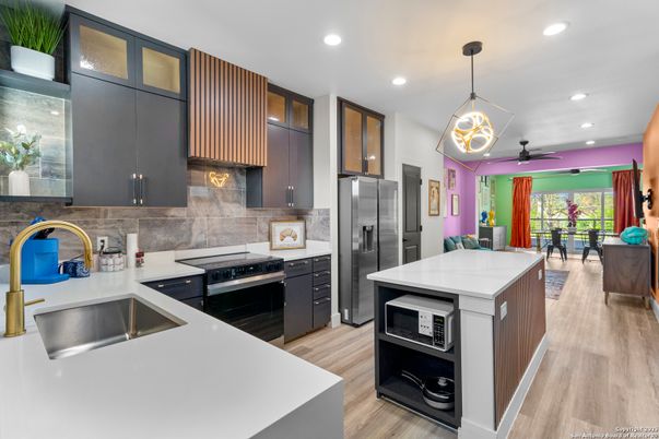 Interior, Kitchen, Pendant Lights, Recessed Lighting, Stainless Steel Appliances, Wood Texture Flooring