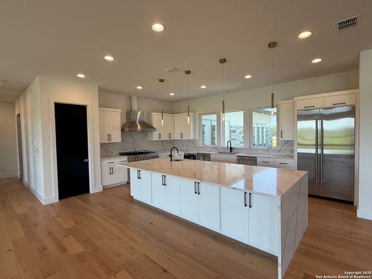Interior, Kitchen, Pendant Lights, Recessed Lighting, Stainless Steel Appliances, Wood Texture Flooring