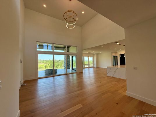 Empty room, Interior, Kitchen, Pendant Lights, Recessed Lighting, Wood Texture Flooring