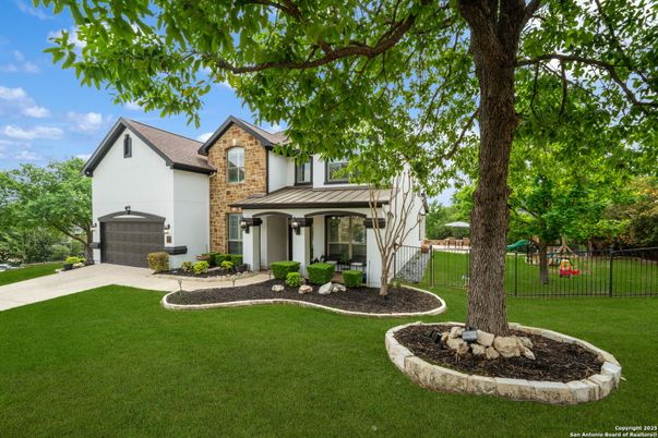 Attached, Backyard, Exterior, Facade, Brick Facade, Spanish Mediterranean