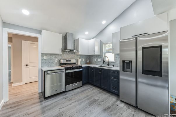 Interior, Kitchen, Recessed Lighting, Stainless Steel Appliances, Wood Texture Flooring