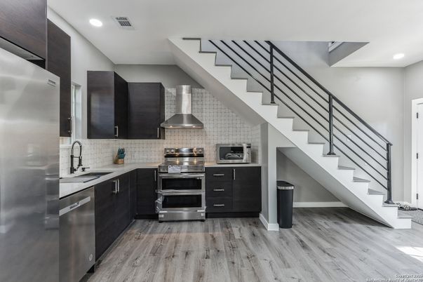 Interior, Kitchen, Recessed Lighting, Stainless Steel Appliances, Wood Texture Flooring