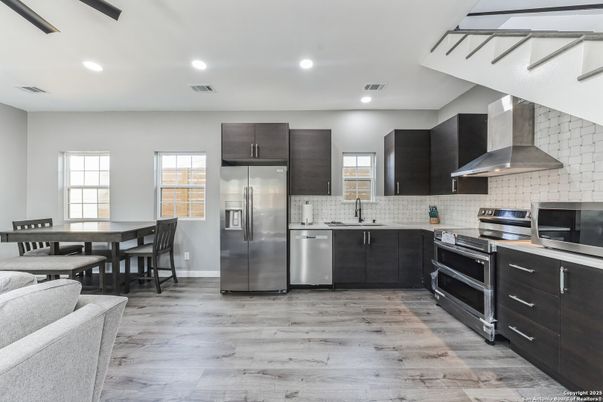 Dining room, Interior, Kitchen, Recessed Lighting, Stainless Steel Appliances, Wood Texture Flooring