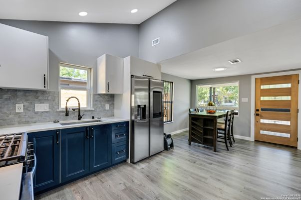 Dining room, Interior, Kitchen, Recessed Lighting, Stainless Steel Appliances, Wood Texture Flooring