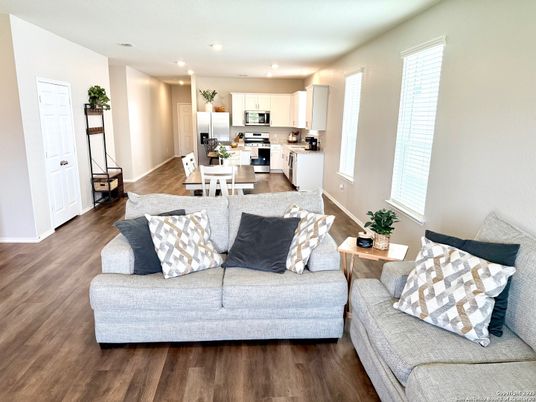 Dining room, Interior, Kitchen, Living room, Recessed Lighting, Stainless Steel Appliances, Wood Texture Flooring