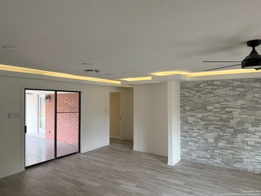 Empty room, Interior, Recessed Lighting, Stone Walls, Wood Texture Flooring