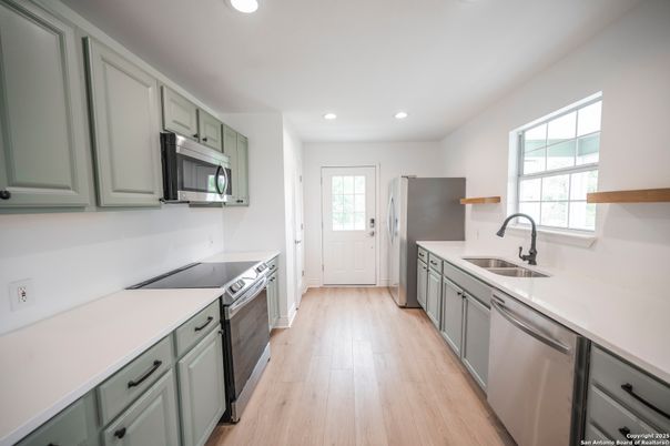 Interior, Kitchen, Recessed Lighting, Stainless Steel Appliances, Wood Texture Flooring