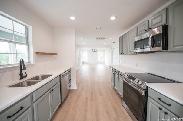 Interior, Kitchen, Recessed Lighting, Stainless Steel Appliances, Wood Texture Flooring