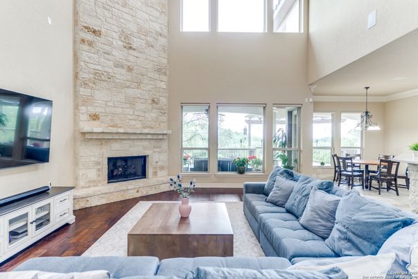 Dining room, Fireplace, Interior, Living room, Pendant Lights, Stone Walls, Wood Texture Flooring