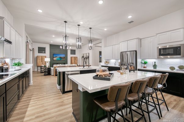 Dining room, Interior, Kitchen, Pendant Lights, Recessed Lighting, Stainless Steel Appliances, Wood Texture Flooring