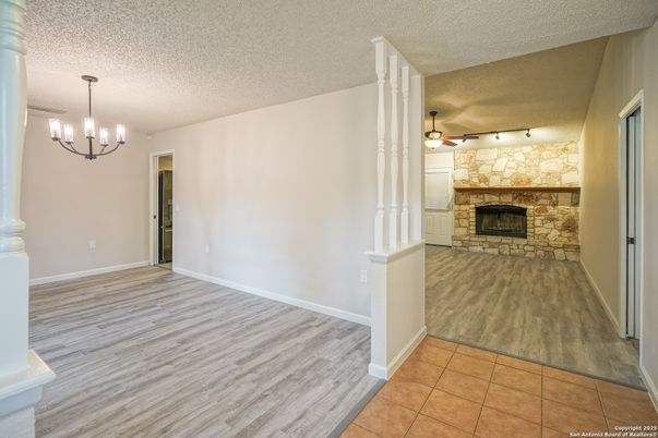 Chandelier, Empty room, Fireplace, Interior, Pendant Lights, Wood Texture Flooring